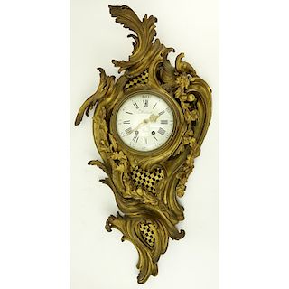 Antique French Gilt Bronze Cartel Clock. Not in running condition, rubbing to gilt. Measures 32" H x 17" W.