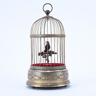 Antique French Gilt Brass Singing Bird in Cage. Stamped 'Made in France' and numbered 5427531 on underside.