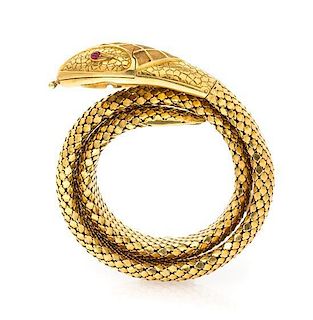 An 18 Karat Yellow Gold and Ruby Snake Cuff Bracelet, 46.90 dwts.