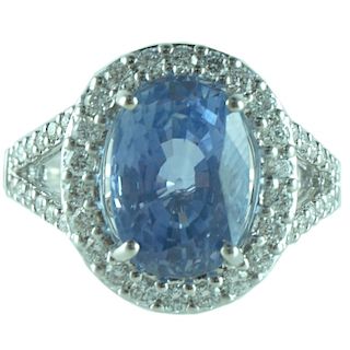 6.20ct Oval Ceylon Sapphire Halo Diamond Ring.