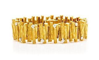 An 18 Karat Yellow Gold and Diamond Textured Link Bracelet, French, 43.40 dwts.