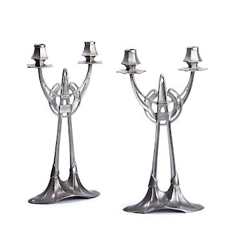 Two candlesticks, c1902