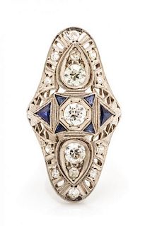 An Art Deco Platinum, Diamond and Synthetic Sapphire Ring, 3.90 dwts.