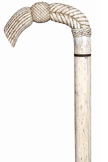 1. Whale Bone cane ca. 1865 – A well carved and cross-hatched whale bone handle, baleen spacer, ¾” diameter shaft, never had a ferrule. H.- 3 ½” x 2 ½