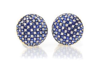 A Pair of 18 Karat White Gold, Sapphire and Diamond Earclips, 13.40 dwts.