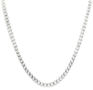 A White Gold and Diamond Line Necklace, 22.40 dwts.