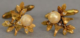 Pair of 14 karat gold cufflinks, each set with pearl and small diamond. 9.4 grams   Provenance: Estate of Peggy & David Rockefel...