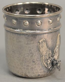 Silver cup having hand hammered body with horse head handles, flanked by large wings. height 3 1/4 inches, 5.1 troy ounces 

Provena...