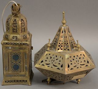 Group of eight Moroccan brass and glass lanterns. heights 16 inches to 19 inches.   Provenance: Estate of Peggy & David Rockefel...