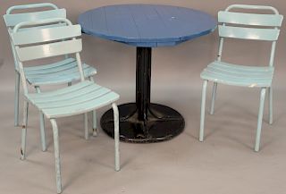 Four piece outdoor set to include a round metal table and three side chairs. table: height 30 inches, diameter 36 inches.   Prov...