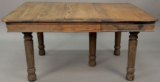 Square oak table with one leaf. open: 42" x 55", closed: 42" x 42"   Provenance: Estate of Peggy & David Rockefeller having stam...