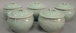 Seven piece lot to include five glazed Celadon style pots with covers, late 20th century along with an extra cover and a bowl. pots:...