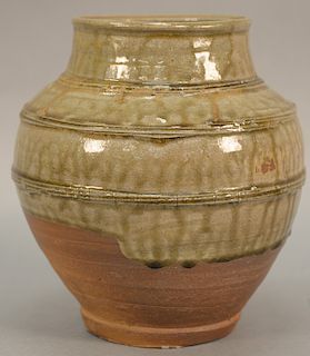 Green drip glazed stoneware urn with old paper label on bottom and Rockefeller inventory label on bottom inscribed D.R. 73.9002, hei...