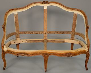 French Louis XV small canape settee carved frame, no upholstery. length 45 1/2 inches.    Provenance: Estate of Peggy & David Ro...