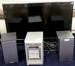 Two piece electronics lot to include a 32" Panasonic T.V. along with an Aiwa stereo complete with two speakers. 

Provenance: Estate...