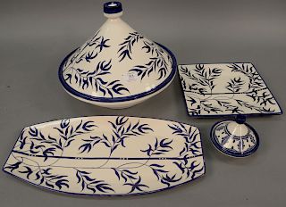Four Naji Fes Moroccan ceramic pieces having blue and white design including a large bowl with cone for cover, a long tray, a square...