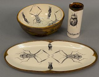 Three Laura Zindel flower beetle ceramic pieces including a large bowl, an oval tray, and a vase, all signed: Laura Zindel. bowl: he...