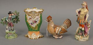 Four piece Staffordshire pieces to include a knight holding sword standing near a shield, a rooster marked with an "A", a figure sta...