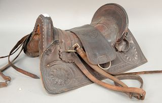 Horse leather saddle, Ribeirinho 1123, S. Paula Brazil (one loop broken). length 24 inches, width 22 inches.   Provenance: Estat...
