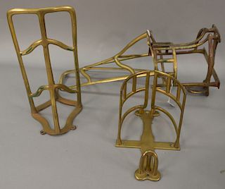 Four piece lot to include two brass bridle racks and two brass saddle racks. bridle racks: height 16 inches, saddle racks: height 8...