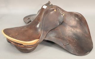 English leather horse saddle. length 26 inches, width 33 inches.   Provenance: Estate of Peggy & David Rockefeller having stamp/...
