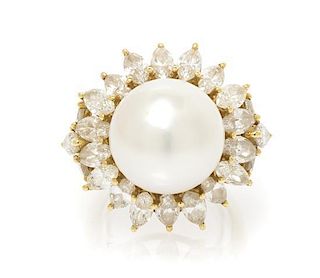 An 18 Karat Yellow Gold, Cultured South Sea Pearl and Diamond Ring, 10.40 dwts.
