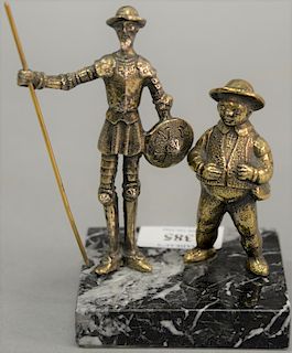 Don Quixote and Sancho Panza bronze figures on marble base. height 5 1/2 inches.   Provenance: Estate of Peggy & David Rockefell...