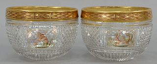 Set of twelve early 19th century crystal cylindrical finger bowls having heavy gilt and painted laurel pattern rim over diamond cut...