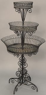 Victorian iron wire three tier plant stand. height 55 inches   Provenance: Estate of Peggy & David Rockefeller having stamp/label.