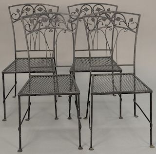 Set of four outdoor side chairs with custom cushions. 

Provenance: Estate of Peggy & David Rockefeller having stamp/label.
