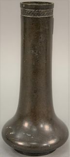 Bronze vase having cylindrical sleeve neck with cross thatching ring on neck, possibly Japanese, 19th century. height 9 3/4 inches 
...