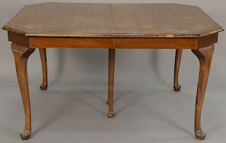 Walnut dining table. height 28 1/2 inches, top: 45" x 54"