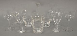 Twelve Baccarat and Steuben crystal pieces to include wine stems, goblets and a decanter. height 3 5/8 inches, to 6 7/8 inches  <R...