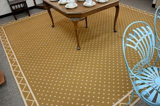 Brown and white woven carpet, 11'8" x 11'4".   Provenance: Estate of Peggy & David Rockefeller.