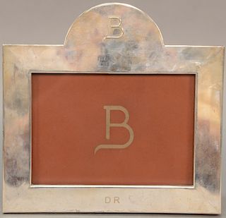 Silver frame with capital "B" in the top crest, monogrammed in the bottom frame "DR". 8 1/2" x 8 3/4"   The monogram DR is that...