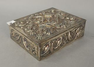 Continental silver box with overall floral repousse. height 2 5/8 inches, top: 7" x 9", 42.4 troy ounces   Provenance: Estate of...