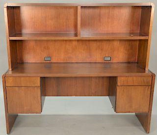 Two part modern office desk having bookcase top. height 59 inches, width 66 inches   Provenance: Estate of Peggy & David Rockefe...