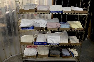 Large assorted lot of linens to include miscellaneous bed sheets, bed skirts, pillow cases, etc.   Provenance: Estate of Peggy &...