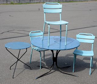 Five piece outdoor set to include a round metal table, three side chairs, and a metal side table. height 28 inches, diameter 42 inch...