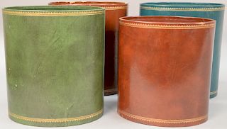 Group of four leather waste paper baskets by C.P. Leather Crafts New York. height 12 inches   Provenance: Estate of Peggy & Davi...