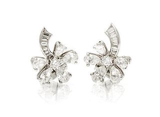 A Pair of Platinum and Diamond Earclips, 6.40 dwts.
