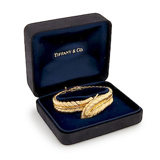 TIFFANY & CO. FRENCH YELLOW GOLD FEATHER CONCEALED BRACELET WATCH