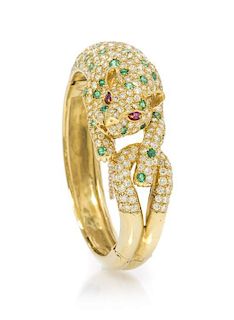 An 18 Karat Yellow Gold, Emerald and Diamond Leopard Bracelet, 36.50 dwts.