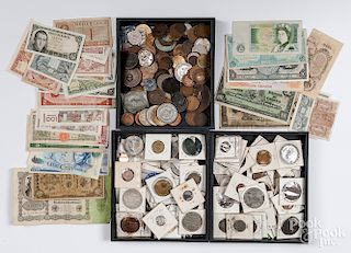 Large collection of foreign coins and currency