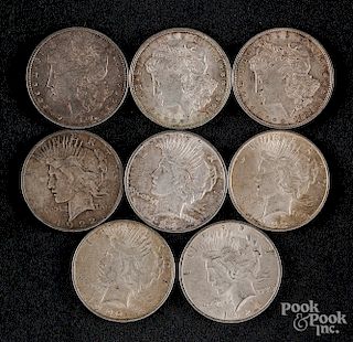 Five Peace silver dollars