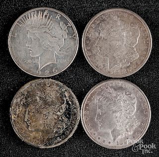 Three Morgan silver dollars