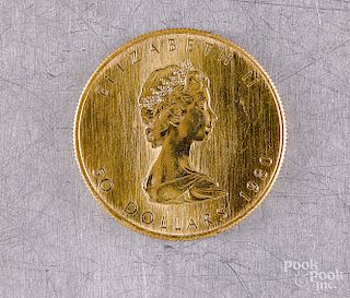 Canadian fifty dollar 1 ozt fine gold coin.