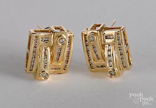 Pair of 14K yellow gold and diamond earrings, 6.6