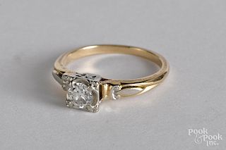 14K gold and diamond solitaire ring