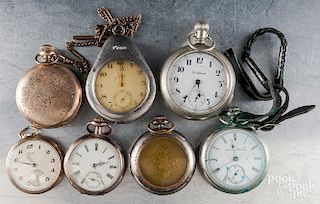 Seven antique pocket watches.
